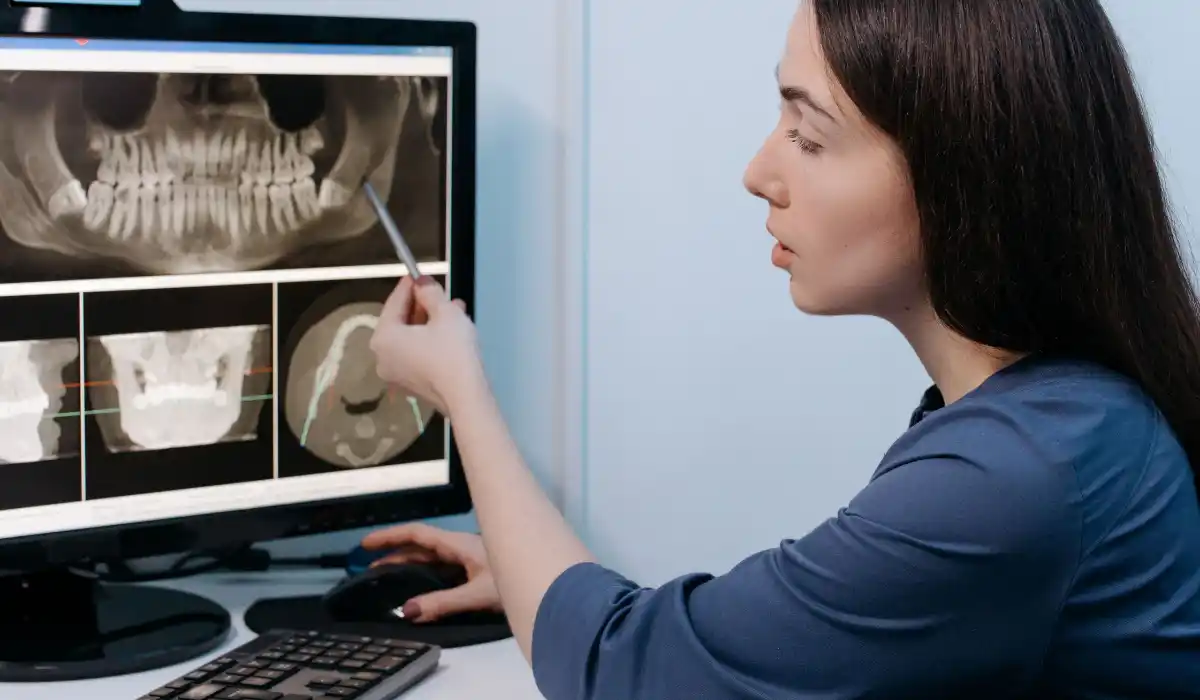 infected wisdom tooth symptoms